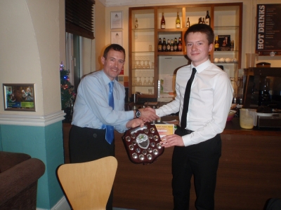 Jon Carberry, NWJS lead coach, presenting Matt with the shield