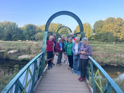 A welcoming committee await the last leg runners